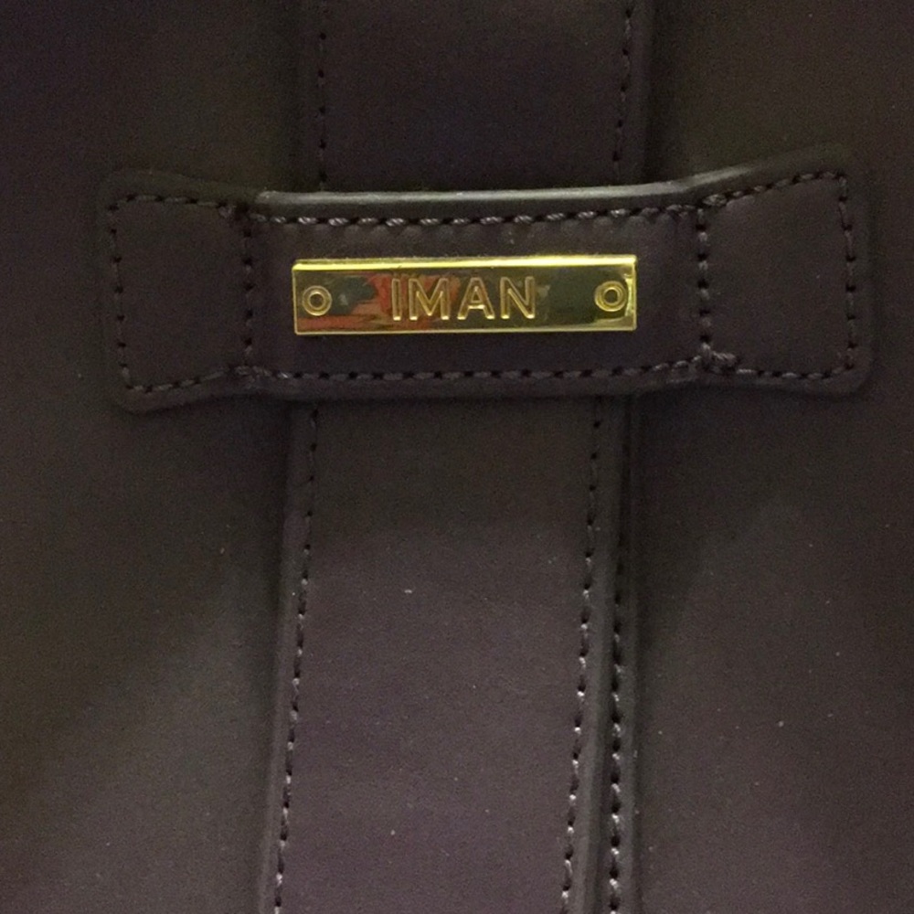 IMAN,EUC,PURPLE TRAPEZOID shape/full SZ Leather bagZippered pocket/3open pockets